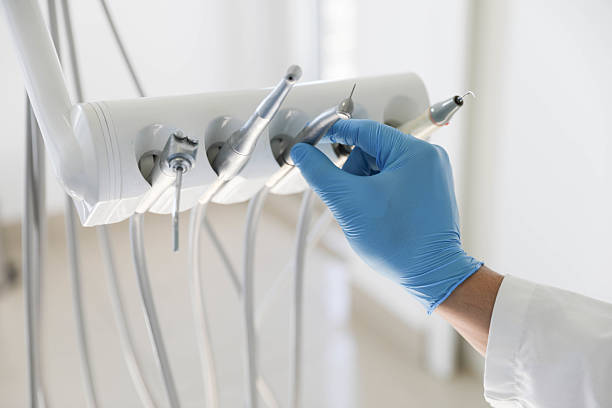 Professional Root Canal Treatment technician working in Warren County County, NC